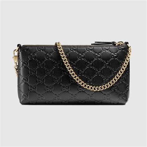 gucci signature wrist wallet black|Gucci signature wallet women's.